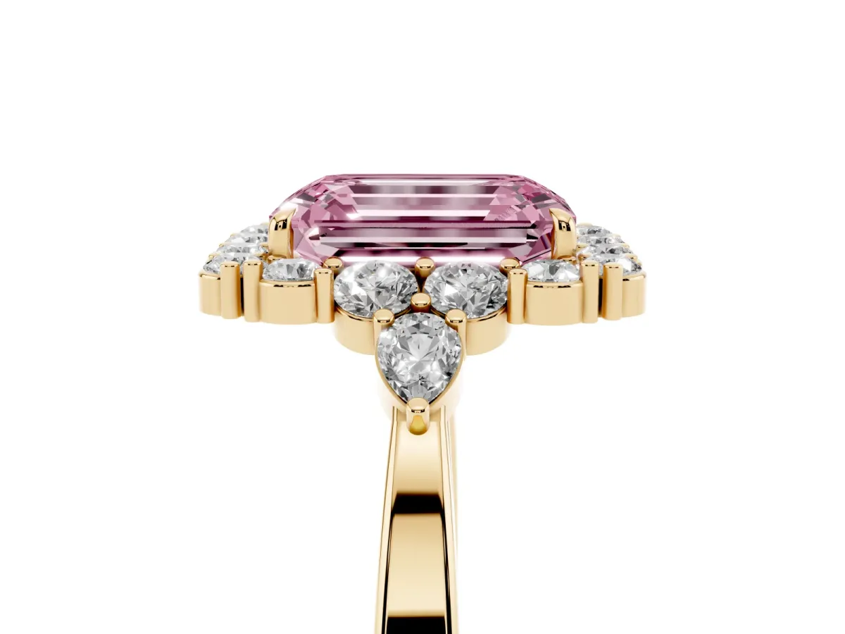 Fancy Pink Emerald Cut Diamond Halo Ring with Pear Side Stones and Prong Setting Yellow gold