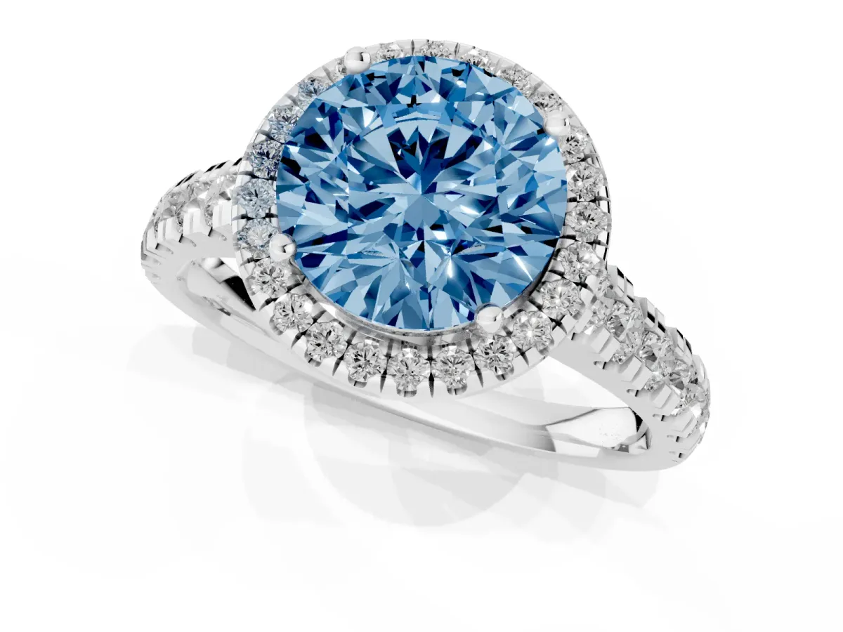 Fancy Blue Round Cut Halo Pavé Diamond Engagement Ring with Four-Prong Setting Silver