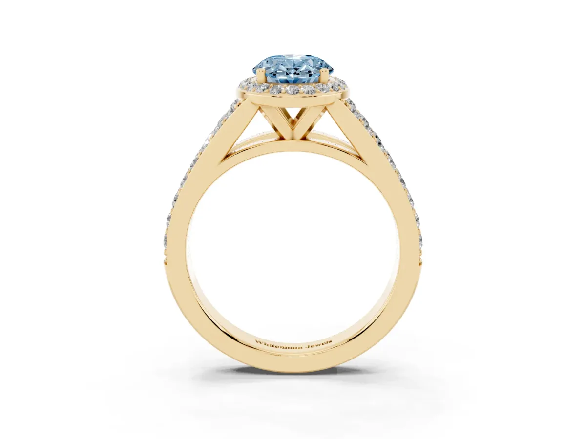 Fancy Blue Oval Cut Diamond Split Shank Halo Ring with Four-Prong Setting Yellow gold