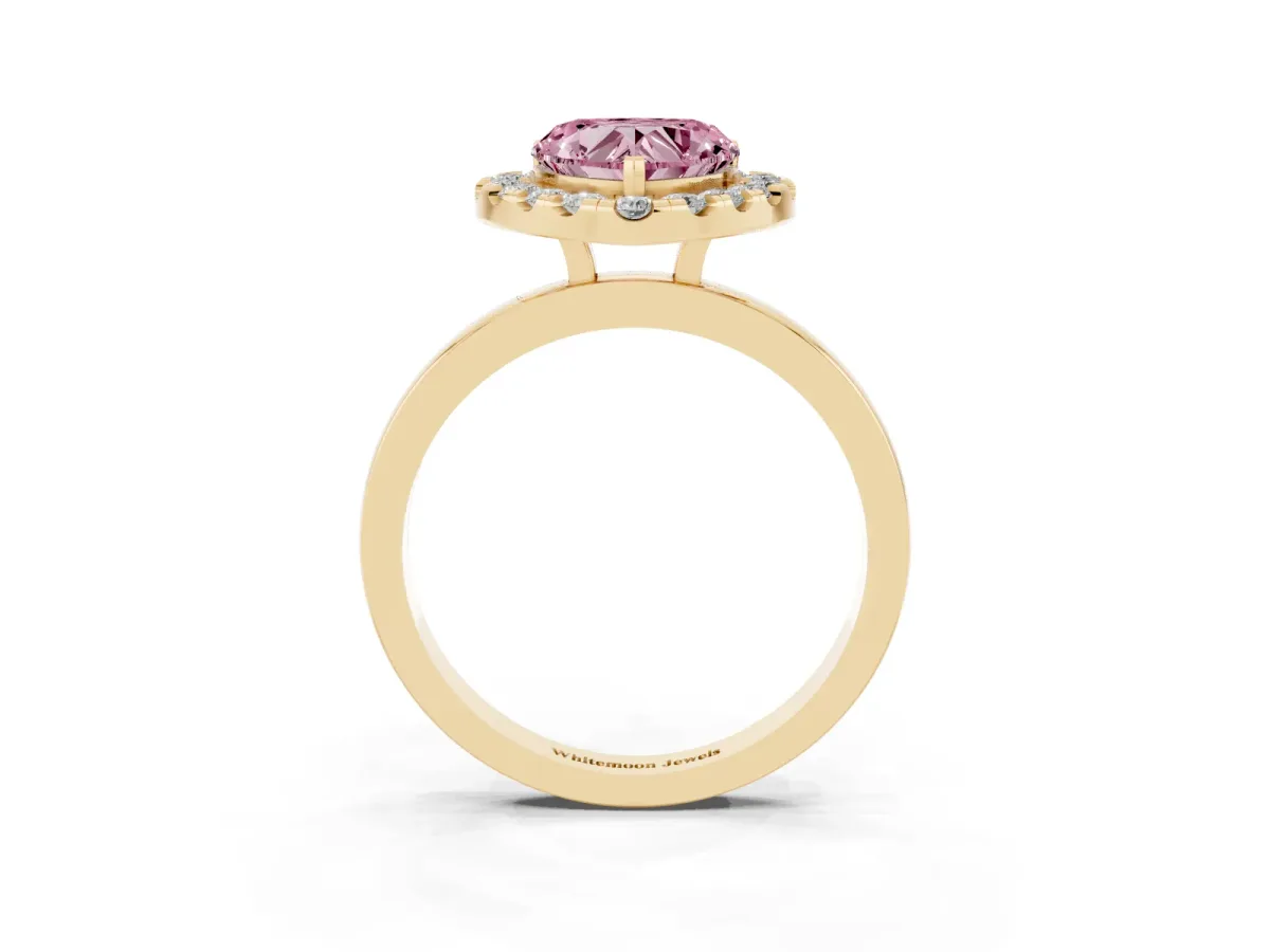Fancy Pink Heart Cut Halo Diamond Solitaire with Pavé Band and Four-Prong Setting Yellow gold