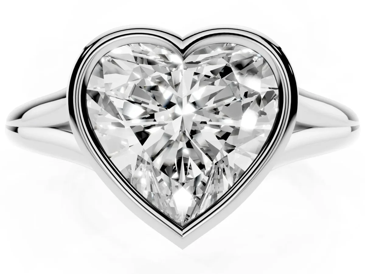 Bezel Set Heart Cut Cut Solitaire Ring with Tapered Band Silver