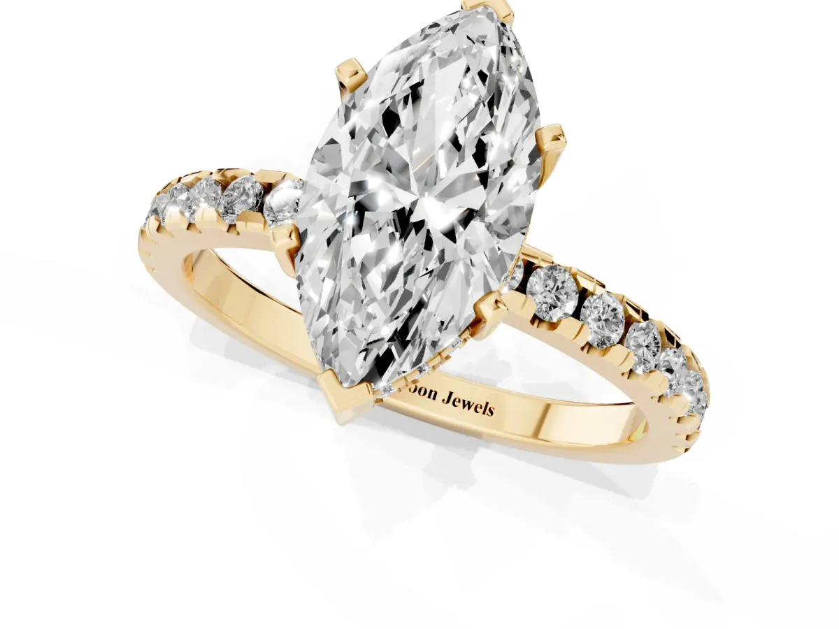 Marquise Cut Diamond Solitaire Ring with Round Pavé Band and Four-Prong Setting Yellow gold