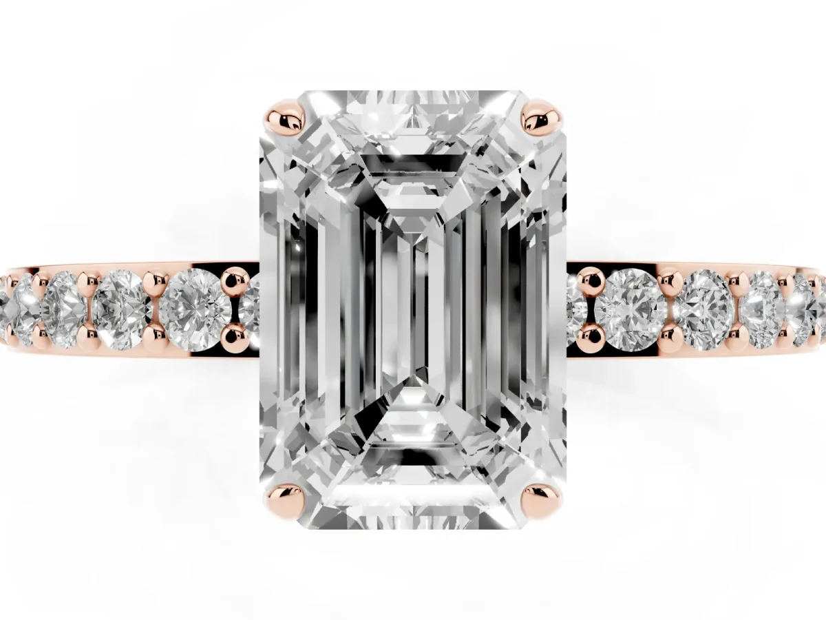 Emerald Cut Diamond Pavé Engagement Ring with Round Accents and Prong Setting Rose gold