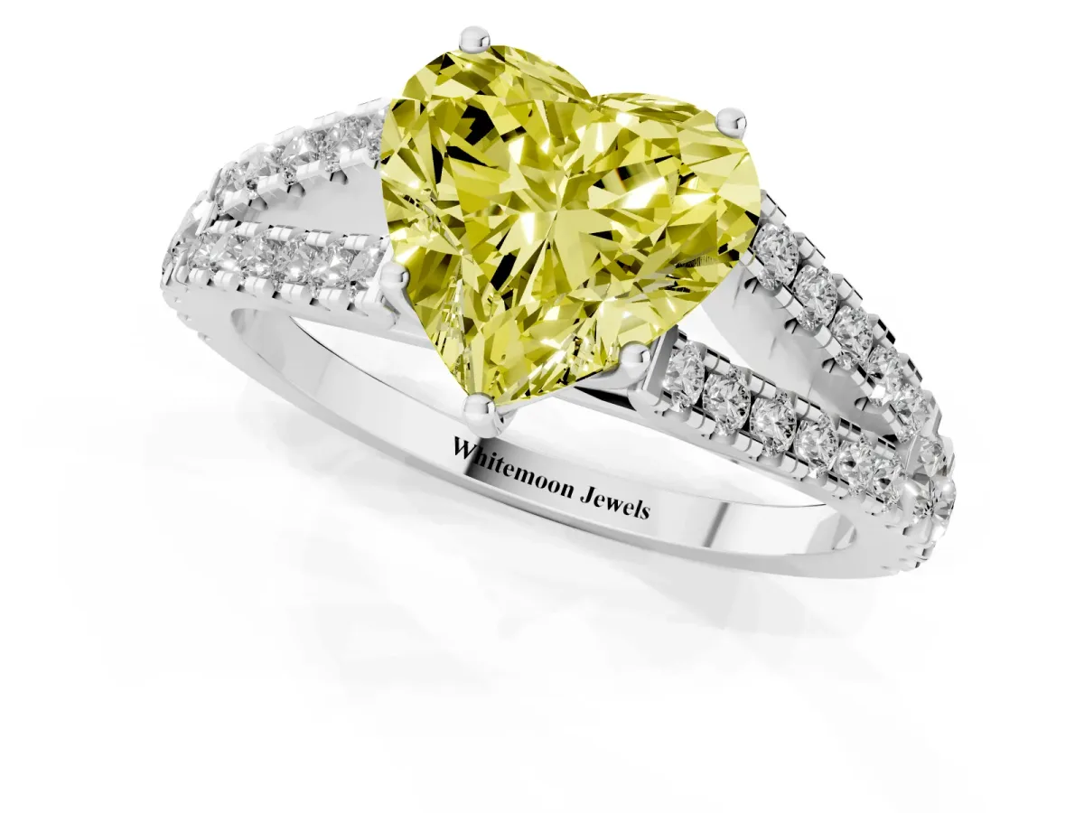 Fancy Yellow Heart Cut Diamond Split Shank Pavé Engagement Ring with Four-Prong Setting Platinum