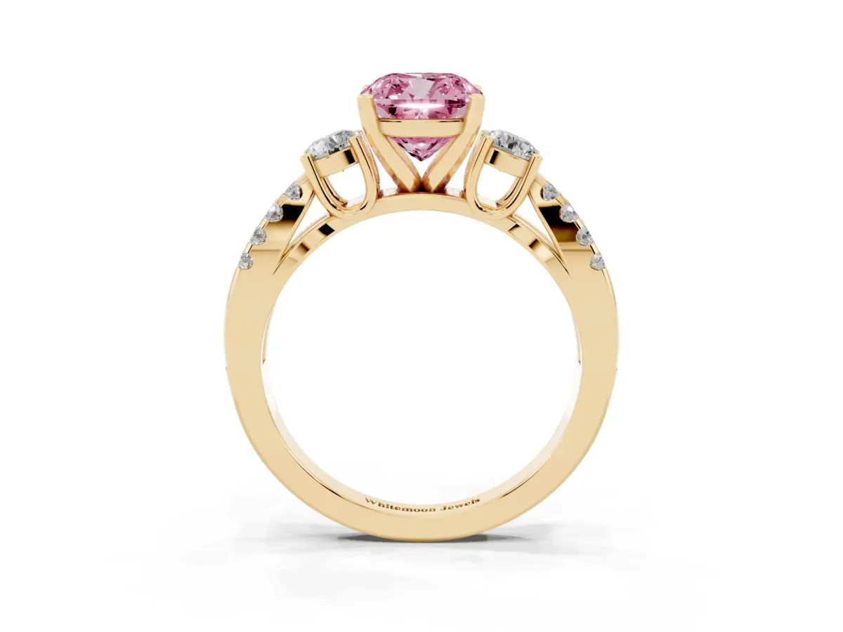 Fancy Pink Cushion Cut Diamond Three-Stone Ring with Pavé Split Shank and Four-Prong Setting Yellow gold