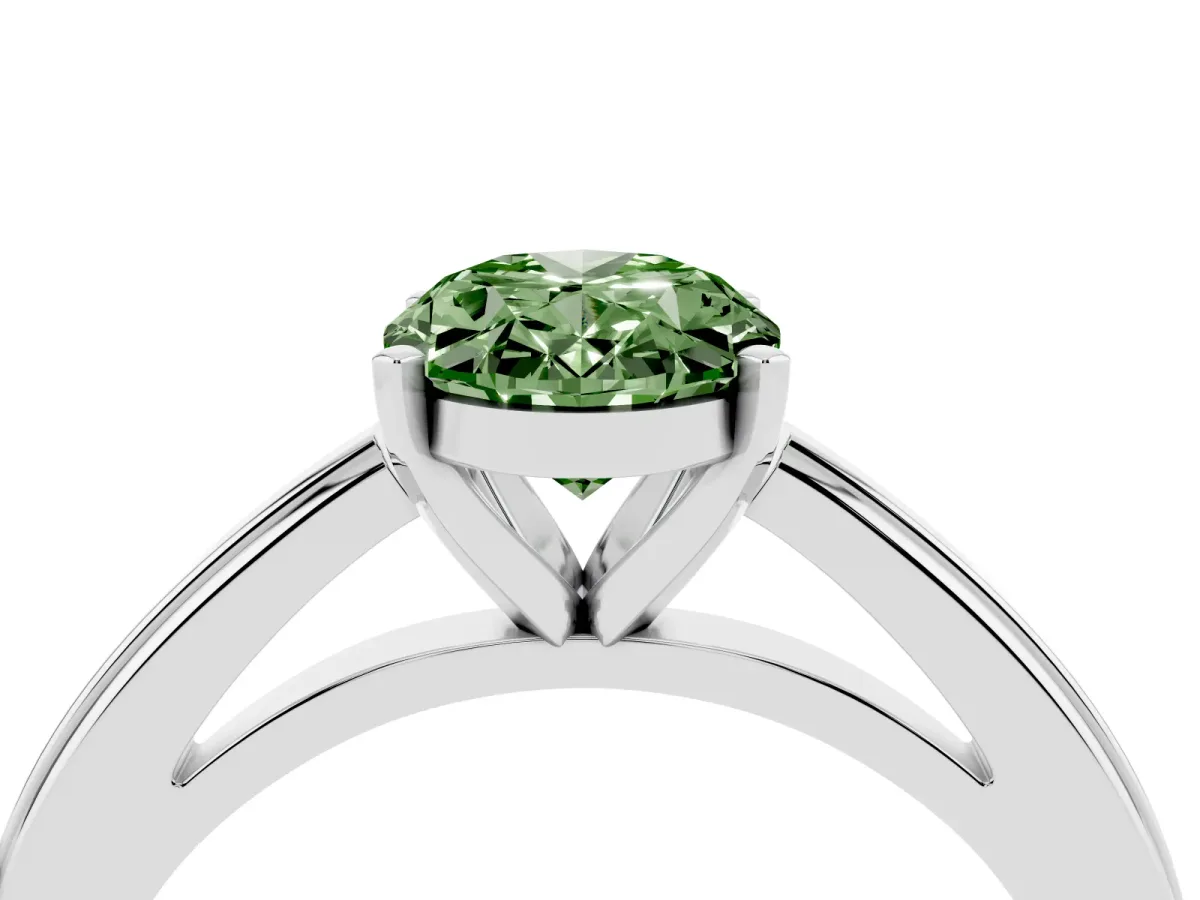 Fancy Green Oval Cut Solitaire Diamond Ring with Four-Prong Setting and Classic Band Silver