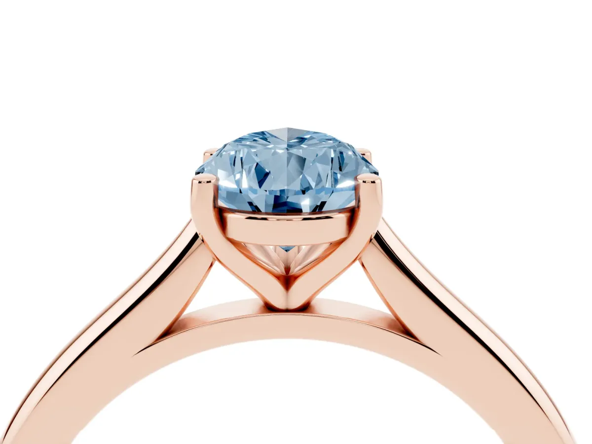 Fancy Blue Pear Cut Cut Solitaire Ring with Cathedral Band and Four-Prong Setting Rose gold