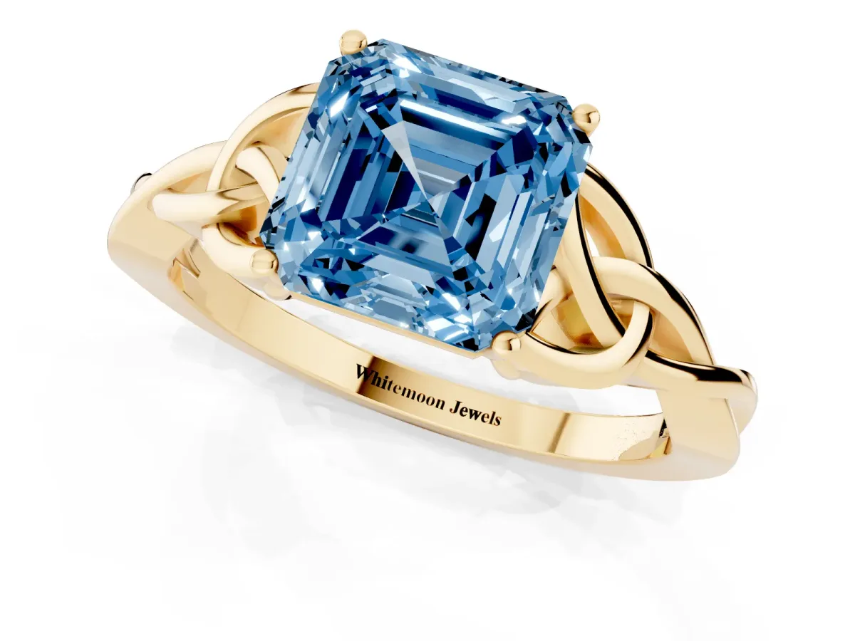 Fancy Blue Asscher Cut Diamond Solitaire Engagement Ring with Celtic Knot Band and Four-Prong Setting Yellow gold