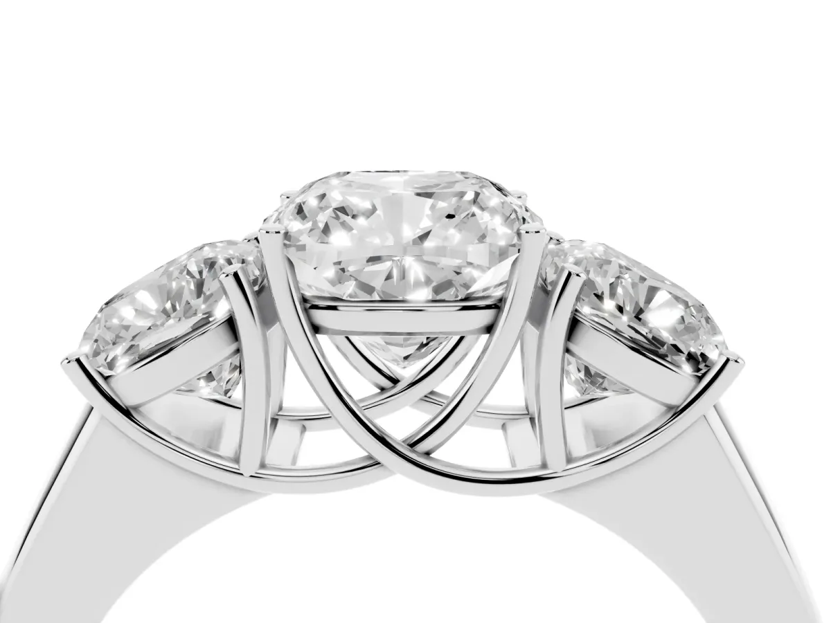 Three-Stone Cushion Cut Cut Diamond Ring with Prong Setting and Classic Band Platinum