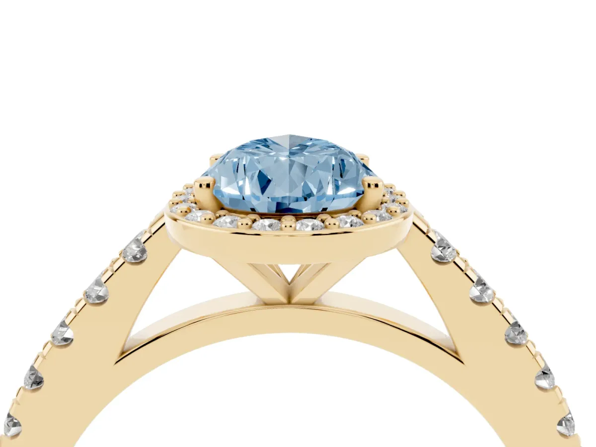 Fancy Blue Pear Cut Cut Halo Diamond Engagement Ring with Pave Band and Four-Prong Setting Yellow gold