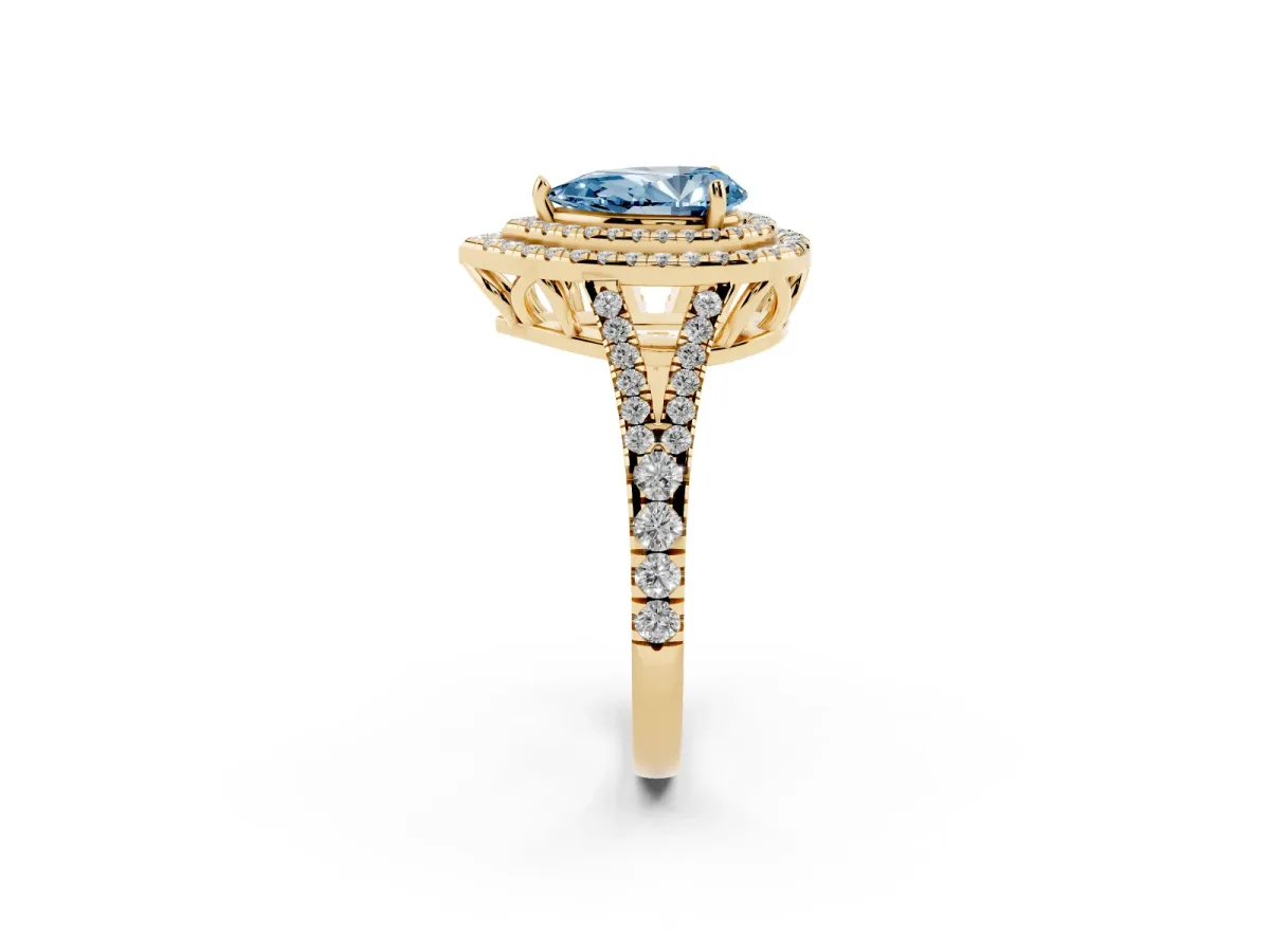 Fancy Blue Pear Cut Diamond Double Halo Ring with Pavé Band and Prong Setting Yellow gold