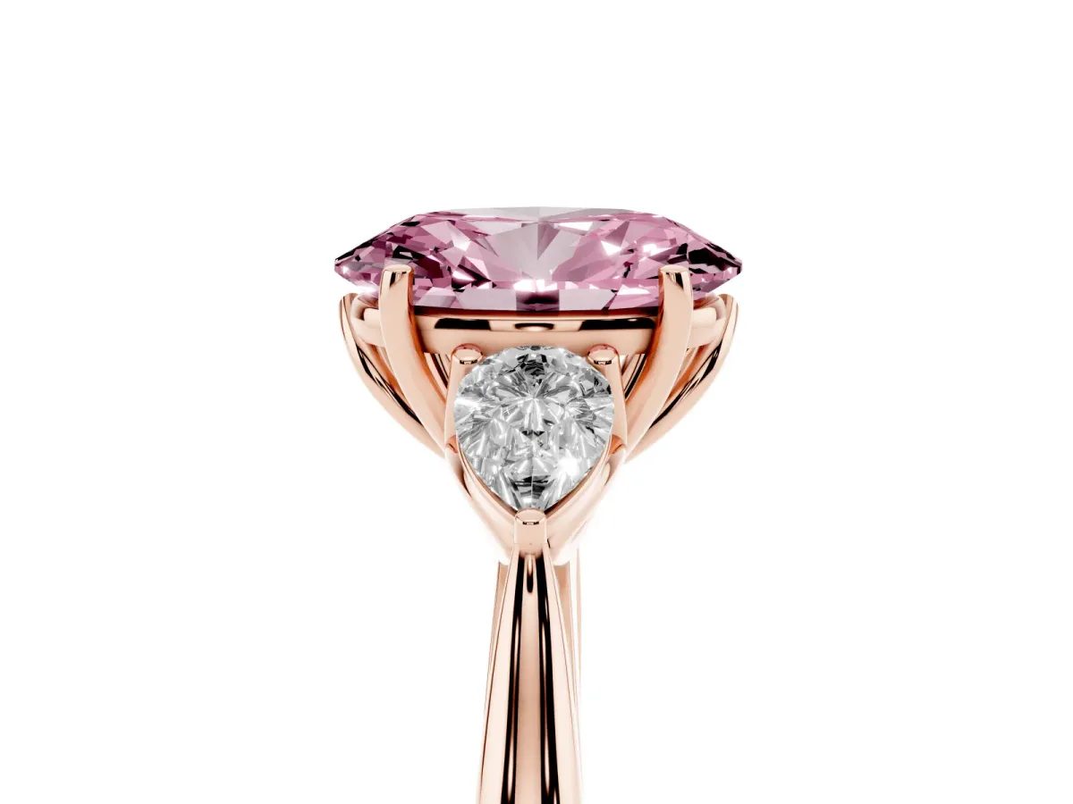 Fancy Pink Oval Cut Diamond Three-Stone Ring with Pear Side Stones and Prong Setting Rose gold