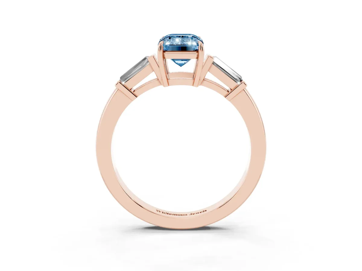 Fancy Blue Emerald Cut Diamond Three-Stone Ring with Tapered Baguette Side Stones and Prong Setting Rose gold