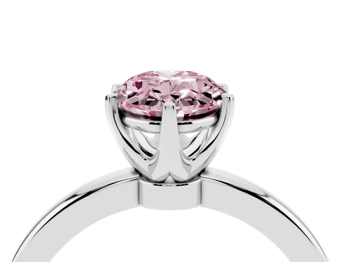 Fancy Pink Oval Cut Solitaire Diamond Ring with Six-Prong Setting on a Classic Band Silver
