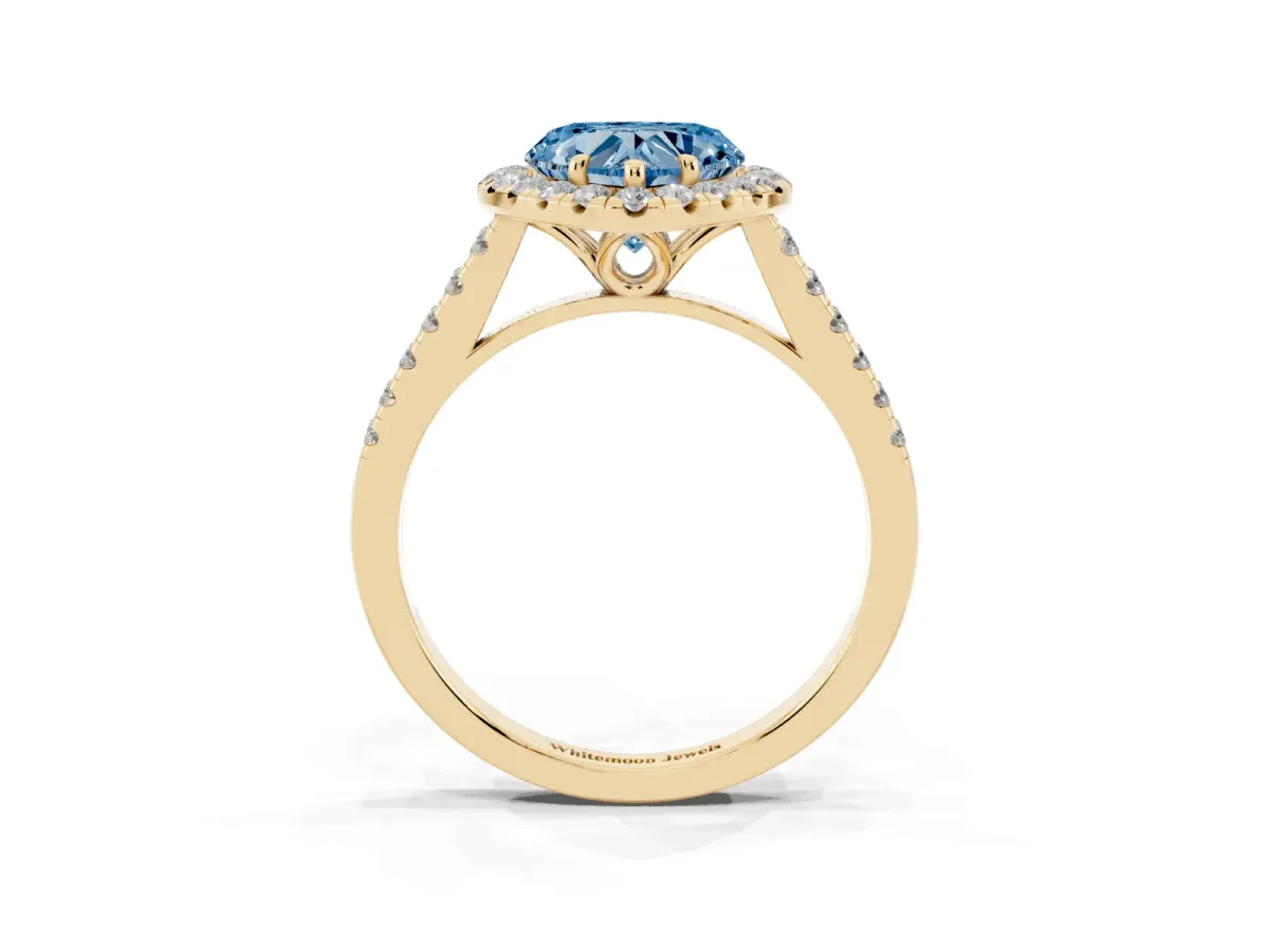 Fancy Blue Heart Cut Halo Pavé Diamond Engagement Ring with Four-Prong Setting Yellow gold