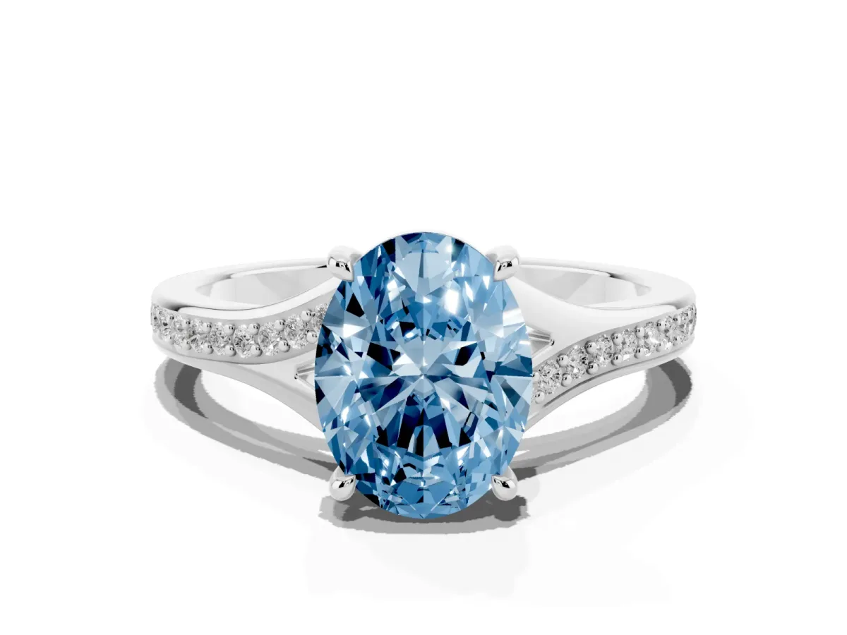 Fancy Blue Oval Cut Diamond Solitaire Ring with Pavé Band and Prong Setting Silver