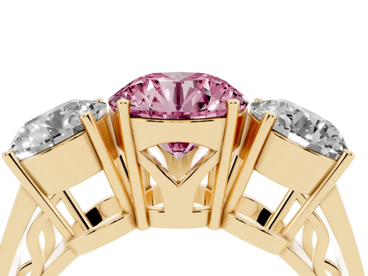 Fancy Pink Round Cut Diamond Three-Stone Ring with Prong Setting and Textured Band Yellow gold