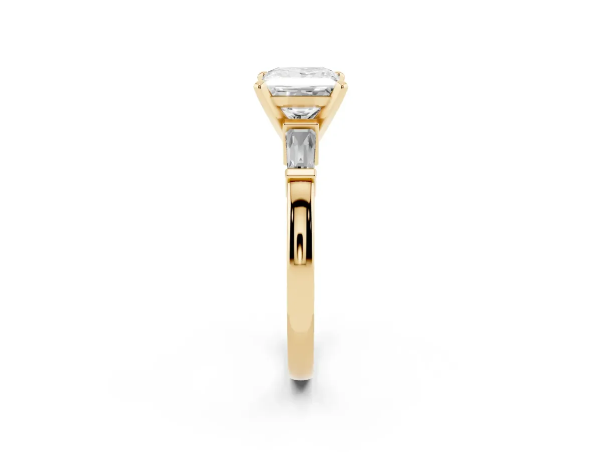 Princess Cut Cut Diamond Solitaire Ring with Tapered Baguette Accents and Four-Prong Setting Yellow gold