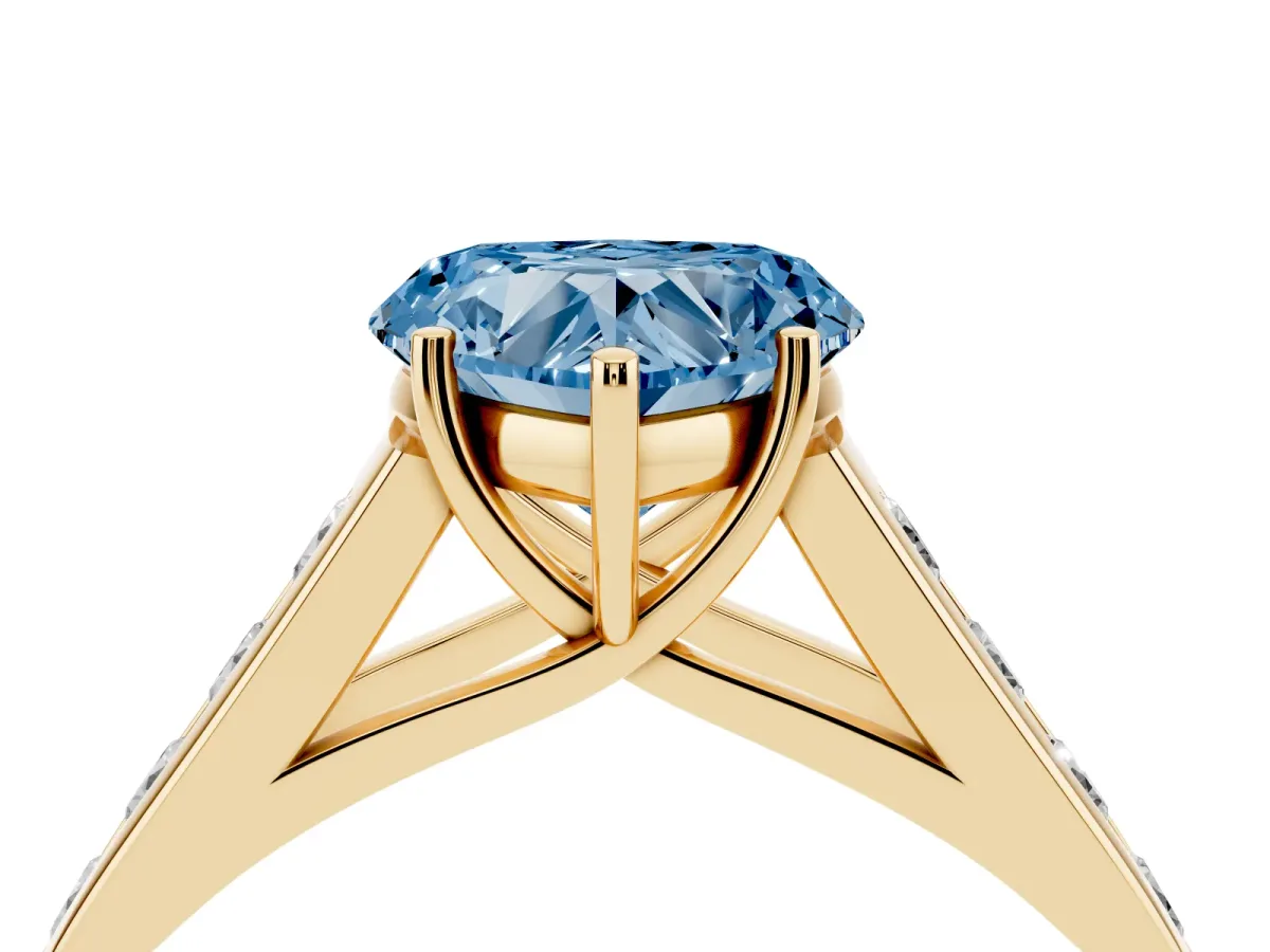 Fancy Blue Heart Cut Brilliant Channel-Set Solitaire Ring with Four-Prong Setting Yellow gold