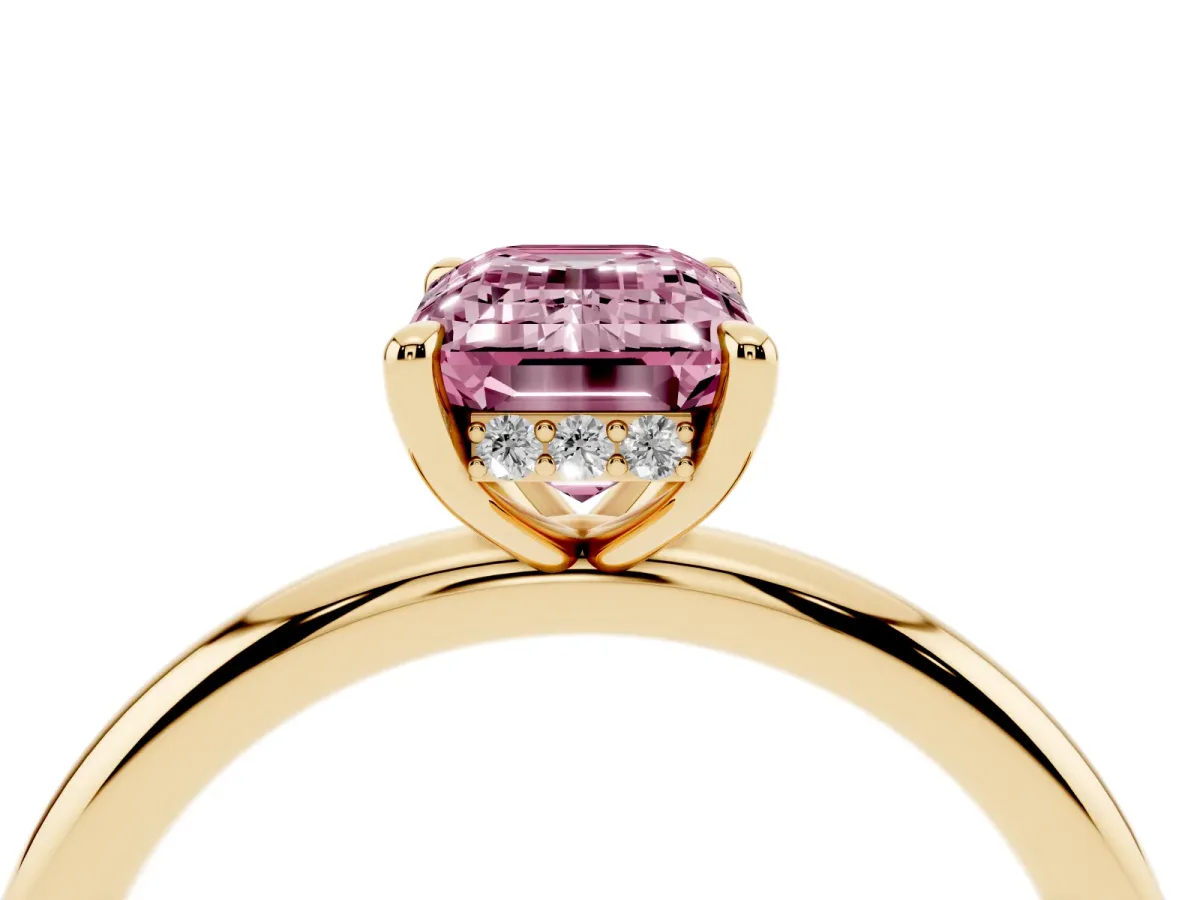 Fancy Pink Emerald Cut Diamond Solitaire Ring with Thin Band and Four-Prong Setting Yellow gold