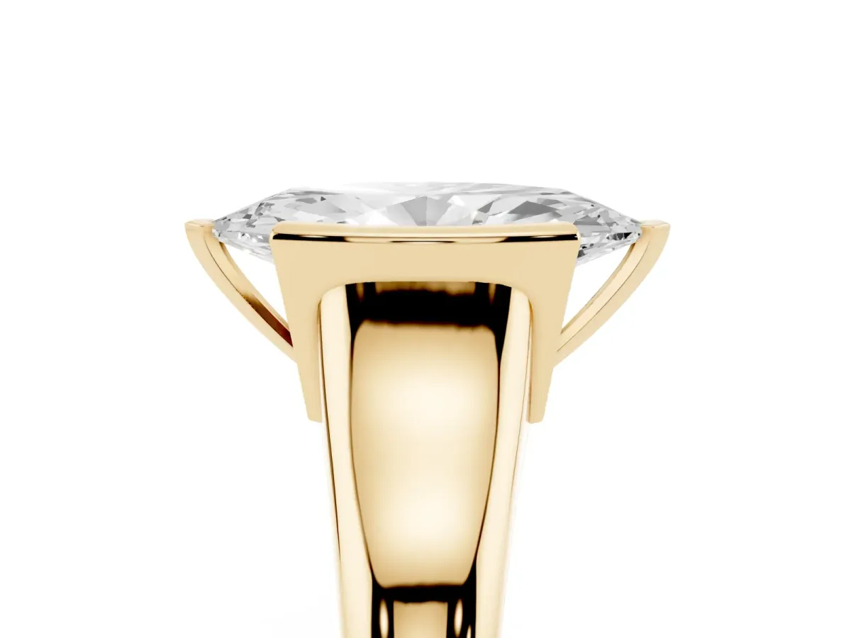 Marquise Cut Solitaire Tension Set Diamond Ring with Split Shank Band Yellow gold
