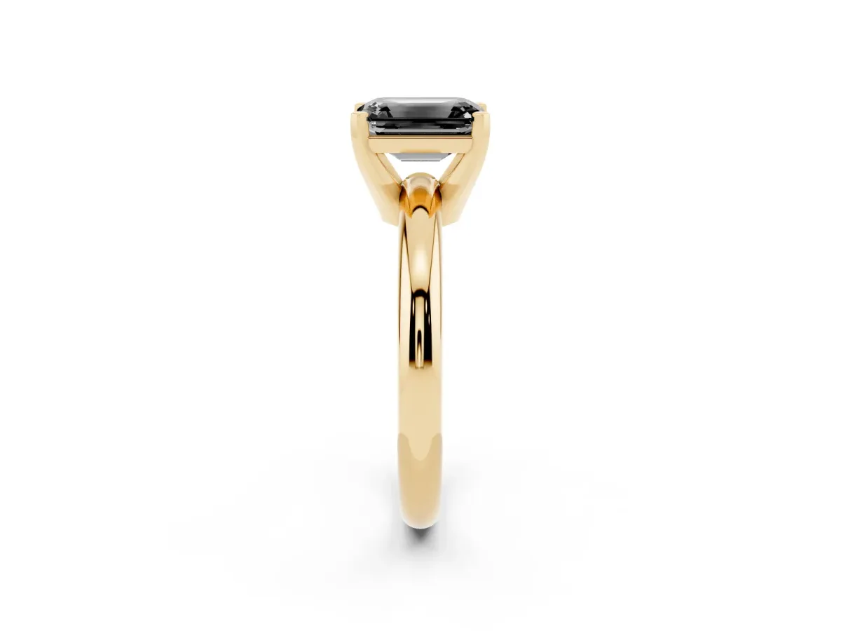 Fancy Black Emerald Cut Diamond Solitaire Engagement Ring with Round Band and Four-Prong Setting Yellow gold