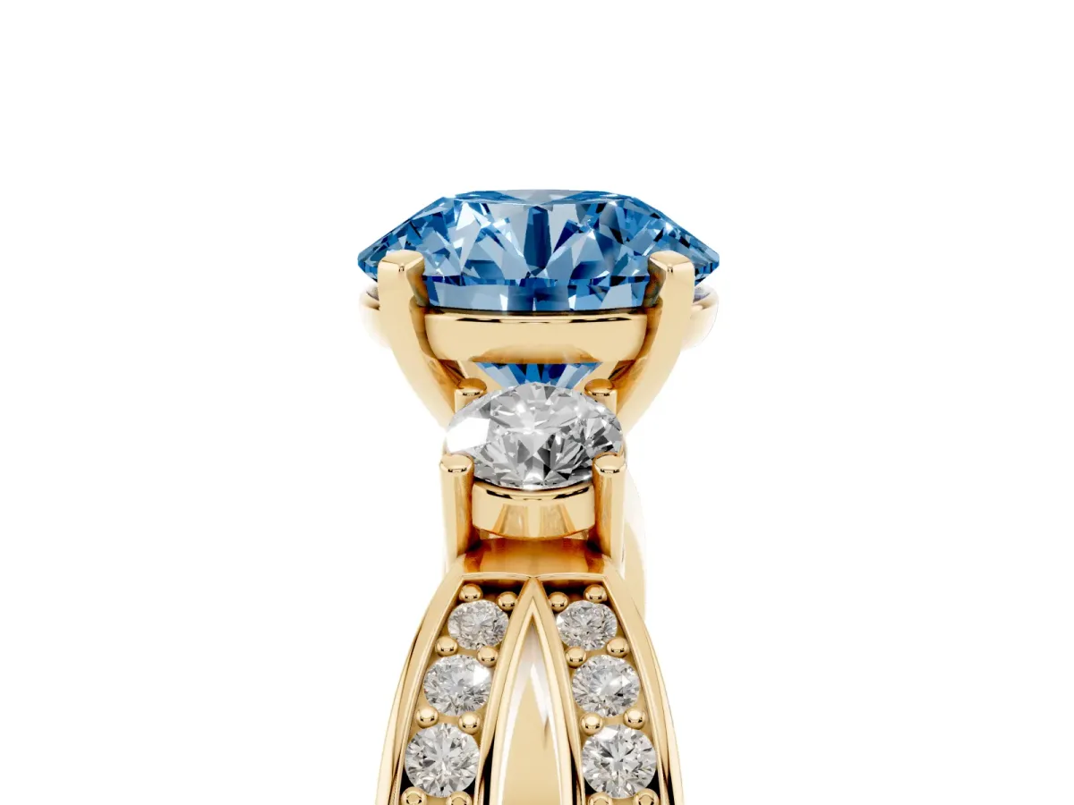 Fancy Blue Three-Stone Round Cut Cut Diamond Twist Band with Prong Setting Yellow gold