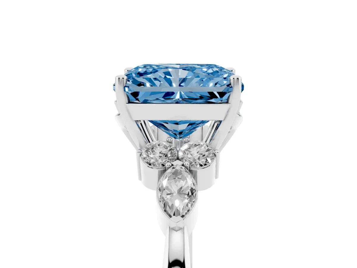 Fancy Blue Radiant Cut Brilliant Diamond Solitaire Ring with Pear Side Stones and Four-Prong Setting Silver