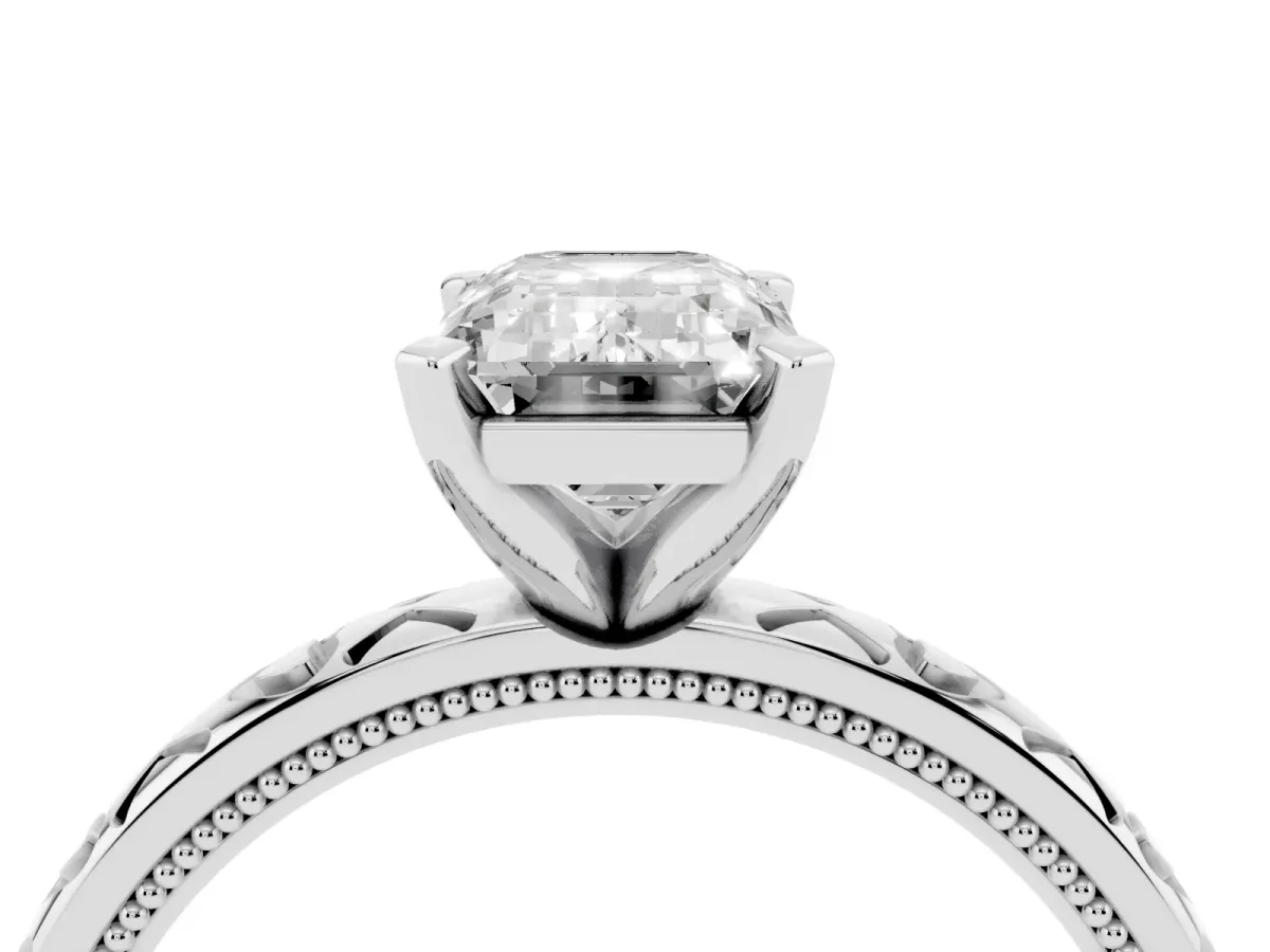 Emerald Cut Solitaire Diamond Engagement Ring with XO Engraved Band and Four-Prong Setting White gold