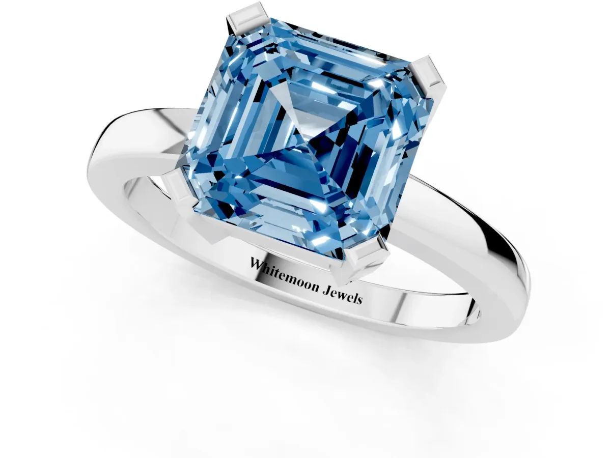 Fancy Blue Asscher Cut Cut Solitaire Ring with Four-Prong Setting and Classic Band Silver