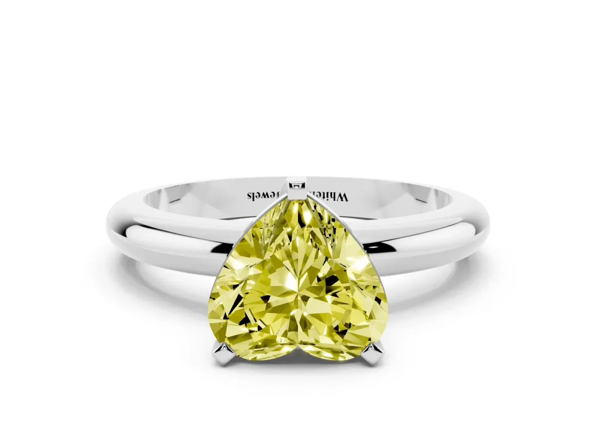Fancy Yellow Heart Cut Diamond Solitaire Engagement Ring with Round Band and Four-Prong Setting Platinum