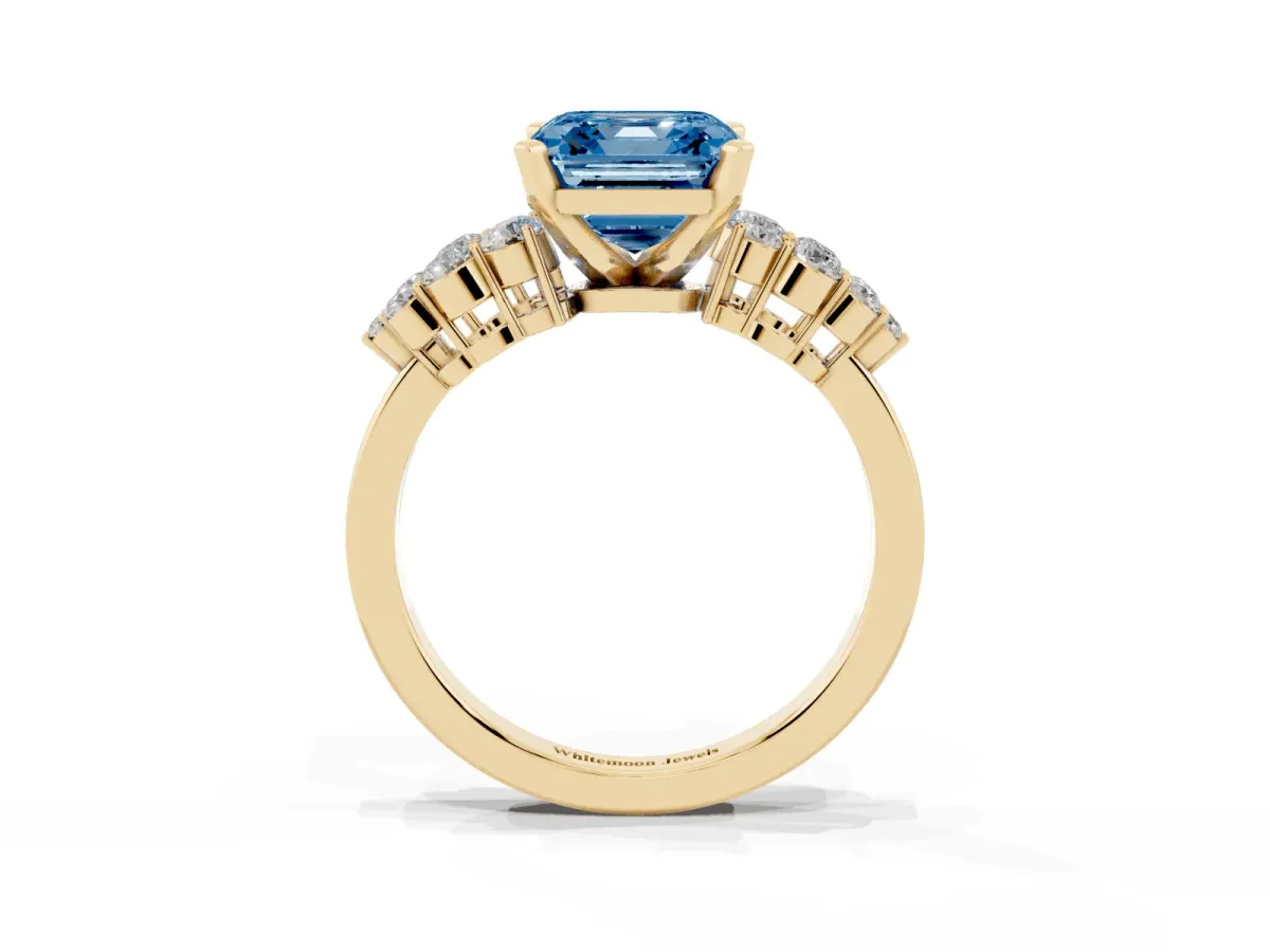 Fancy Blue Asscher Cut Cluster Diamond Engagement Ring with Pavé Band and Four-Prong Setting Yellow gold