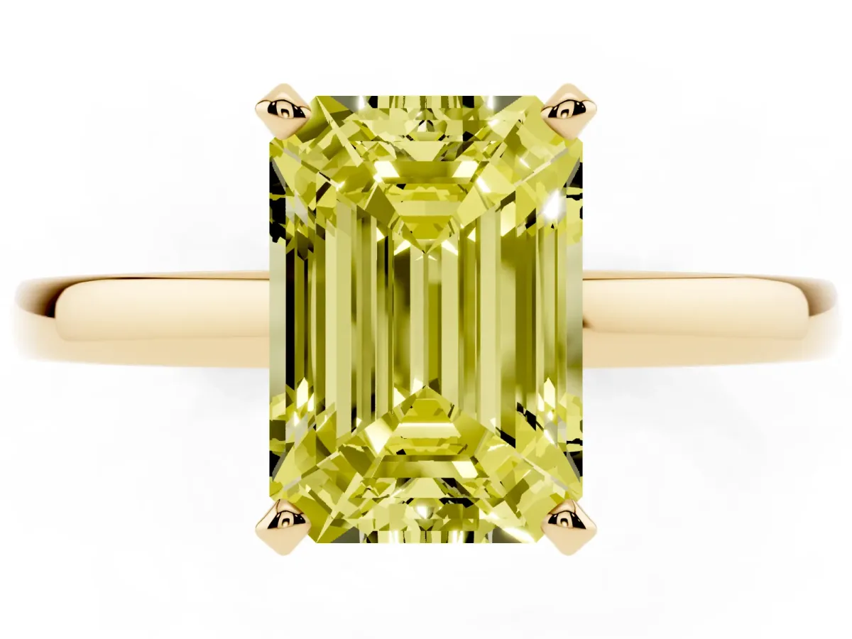 Fancy Yellow Emerald Cut Solitaire Diamond Engagement Ring with Four-Prong Setting on a Classic Band Yellow gold