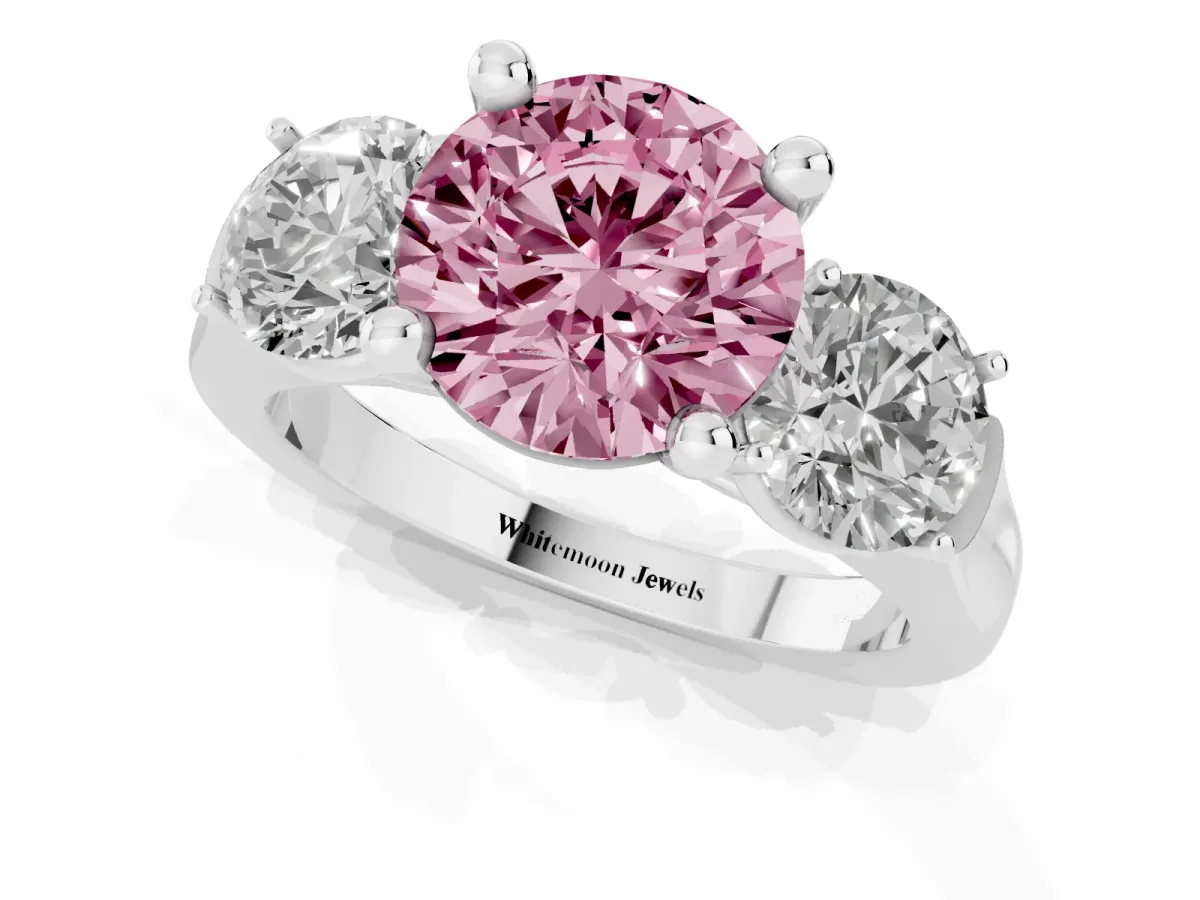 Fancy Pink Three-Stone Round Cut Brilliant Diamond Trellis Ring with Comfort Fit Band Platinum
