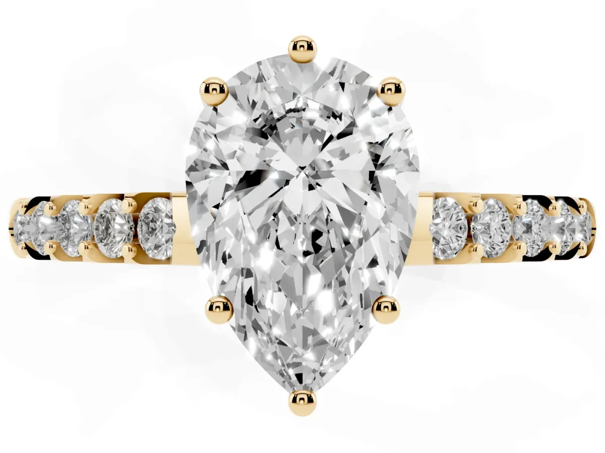 Pear Cut Solitaire Diamond Engagement Ring with Pavé Band and Six-Prong Setting Yellow gold