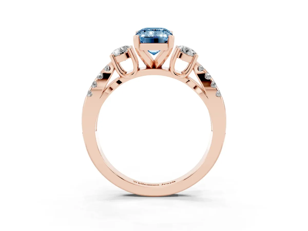 Fancy Blue Emerald Cut Diamond Three-Stone Ring with Pavé Split Shank and Four-Prong Setting Rose gold
