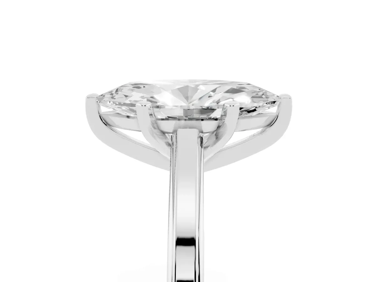 Marquise Cut Solitaire Diamond Ring with Four-Prong Setting and Classic Band Silver