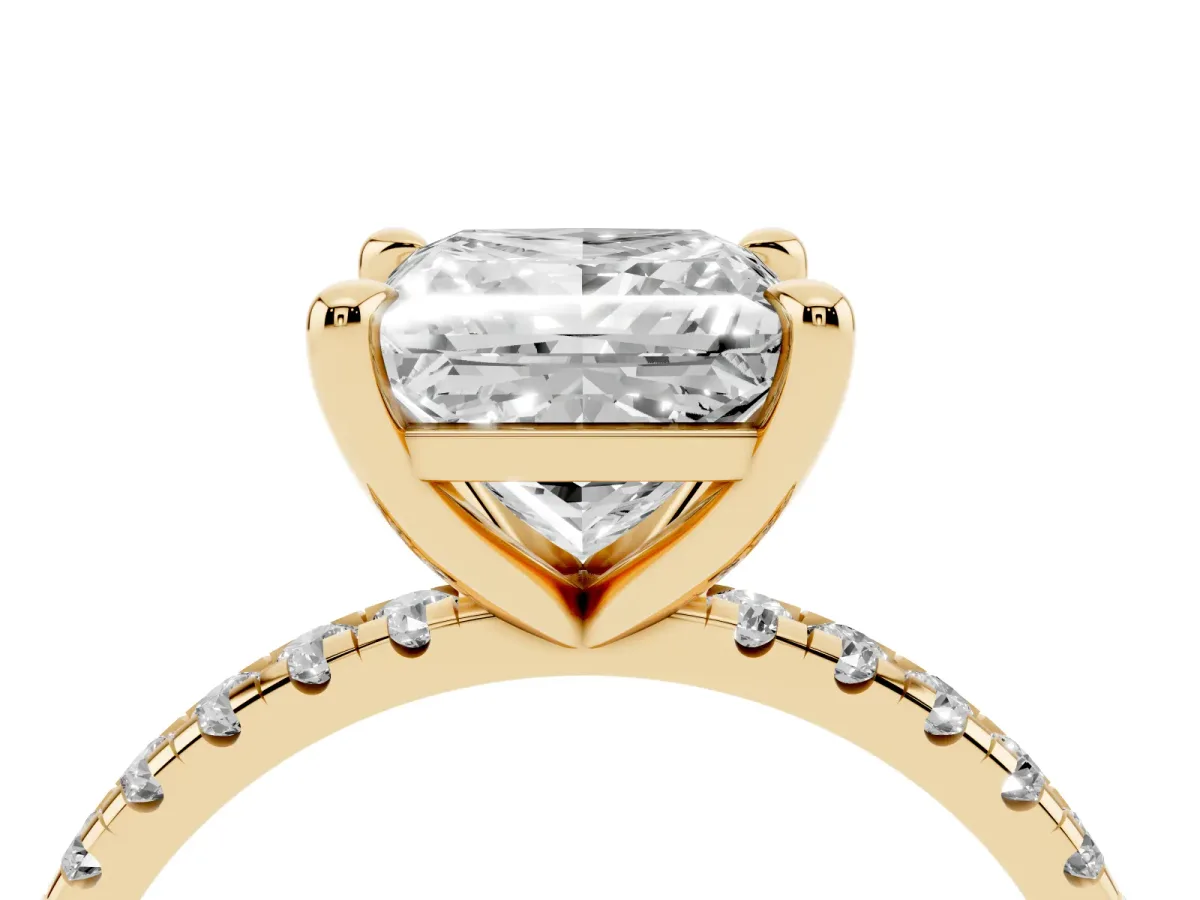 Princess Cut Diamond Brilliant Solitaire Ring with Pavé Band and Four-Prong Setting Yellow gold