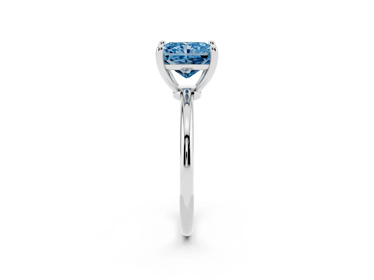 Fancy Blue Radiant Cut Solitaire Diamond Ring with 4-Prong Setting on a Classic Band Silver