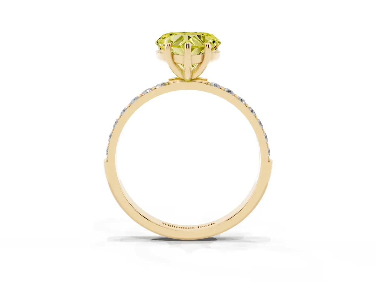 Fancy Yellow Heart Cut Diamond Solitaire Ring with Round Pavé Shoulders and Prong Setting Yellow gold