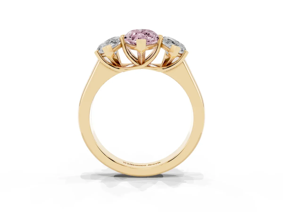Fancy Pink Marquise Cut Three-Stone Diamond Ring with Prong Setting on a Classic Band Yellow gold