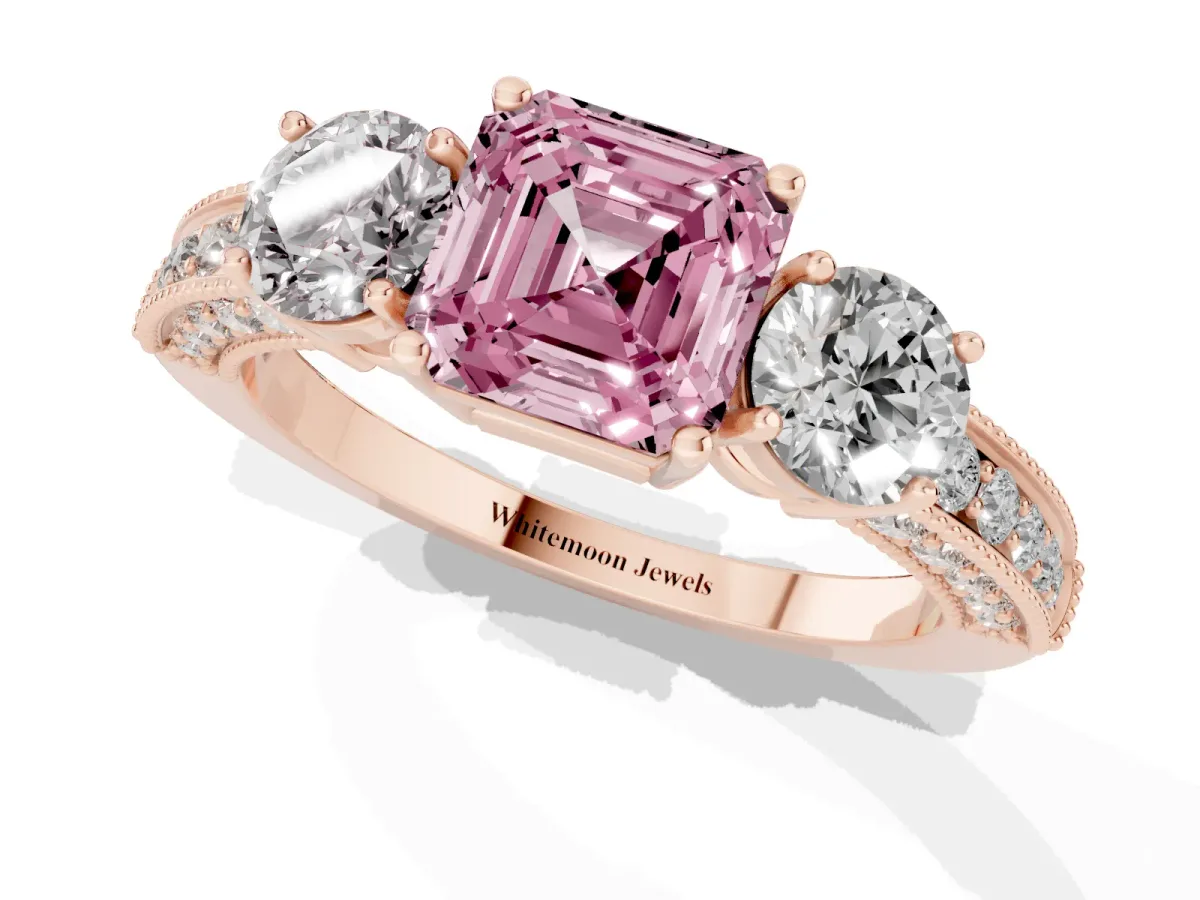 Fancy Pink Asscher Cut Three-Stone Diamond Ring with Pavé Band and Four-Prong Setting Rose gold