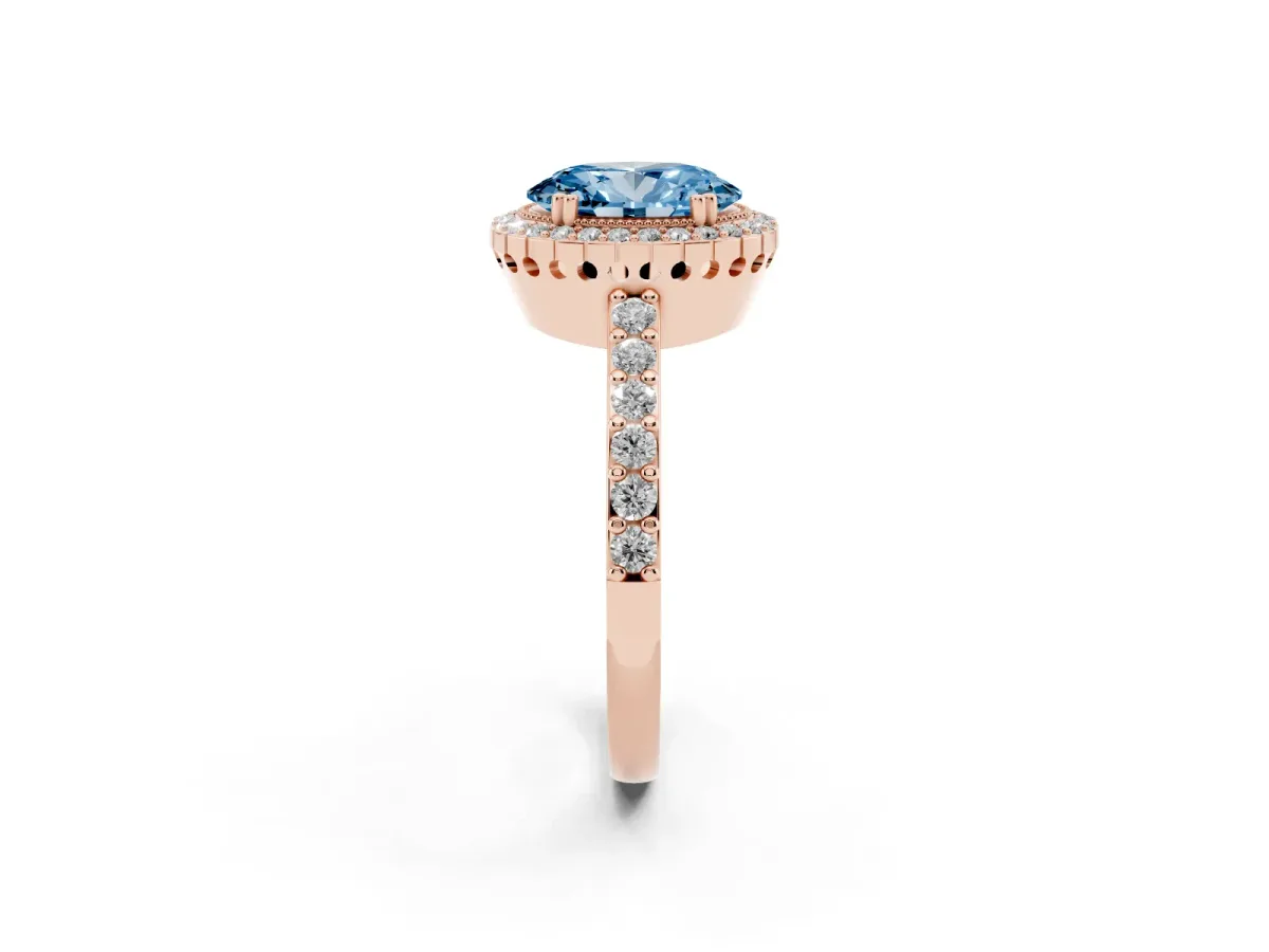 Fancy Blue Oval Cut Cut Diamond Halo Engagement Ring with Milgrain Detail and Pavé Band Rose gold