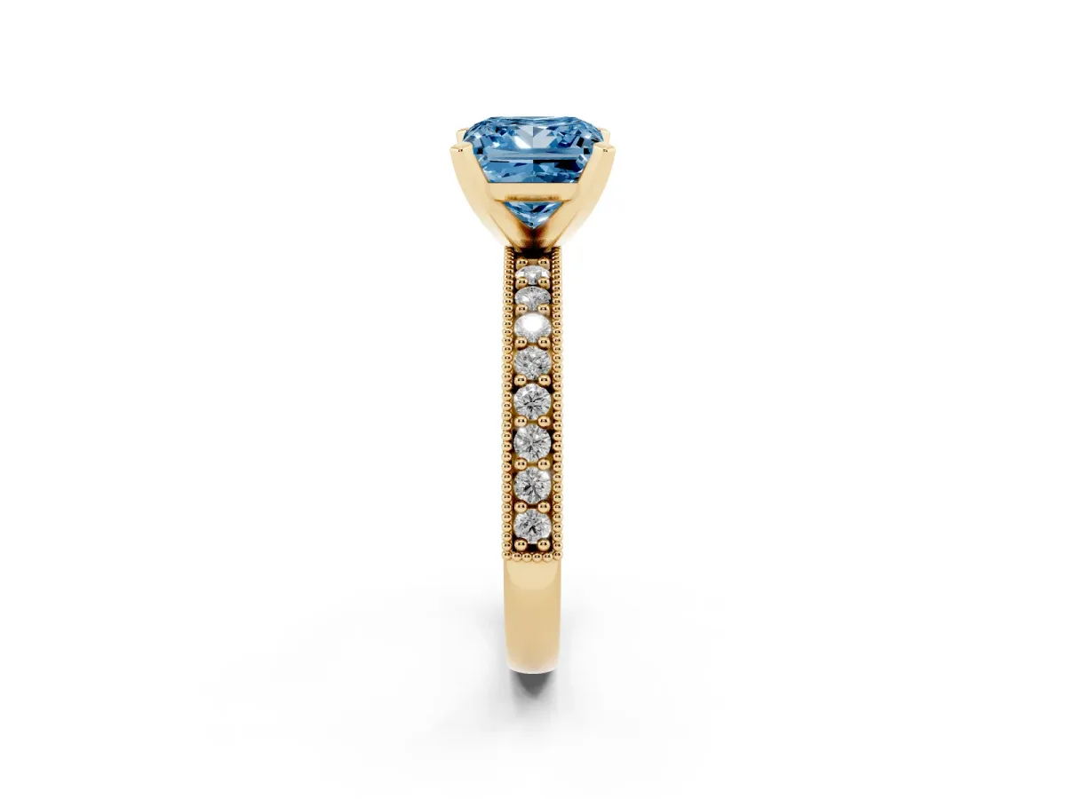 Fancy Blue Princess Cut Diamond Milgrain Pavé Engagement Ring with Four-Prong Setting Yellow gold