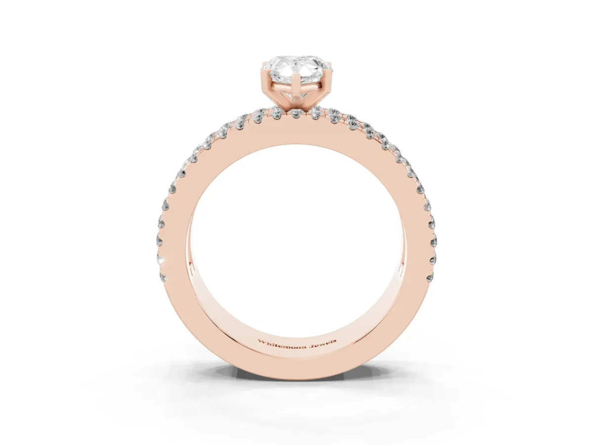 Pear Cut Diamond Solitaire Ring with Pavé and Channel Set Band Rose gold