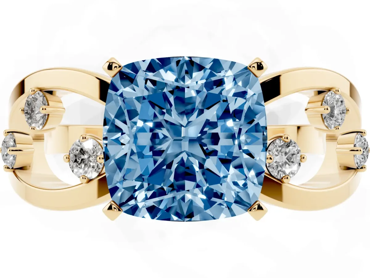 Fancy Blue Cushion Cut Cut Solitaire Diamond with Side Stones on Criss-Cross Band and Four-Prong Setting Yellow gold