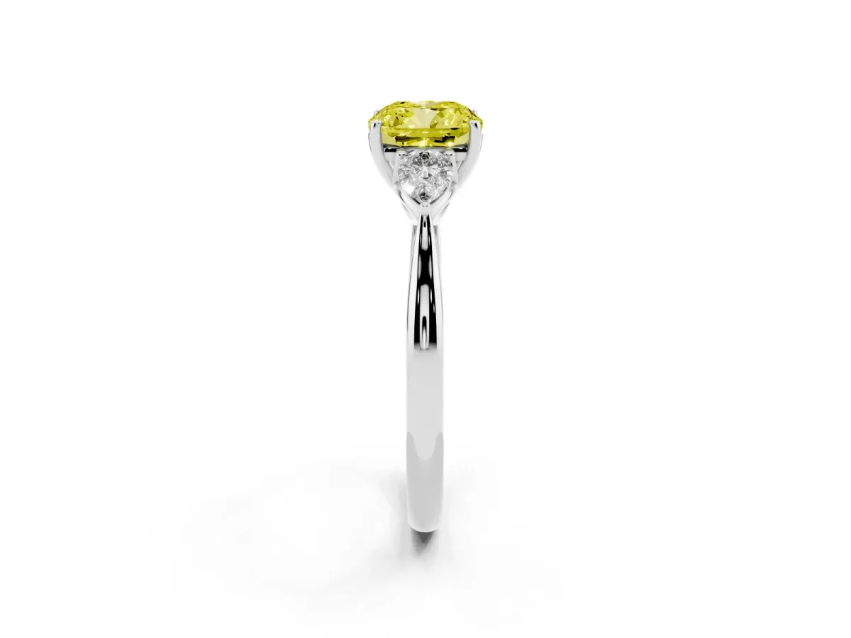 Fancy Yellow Three-Stone Cushion Cut Diamond Ring with Pear Side Stones in Four-Prong Setting Silver