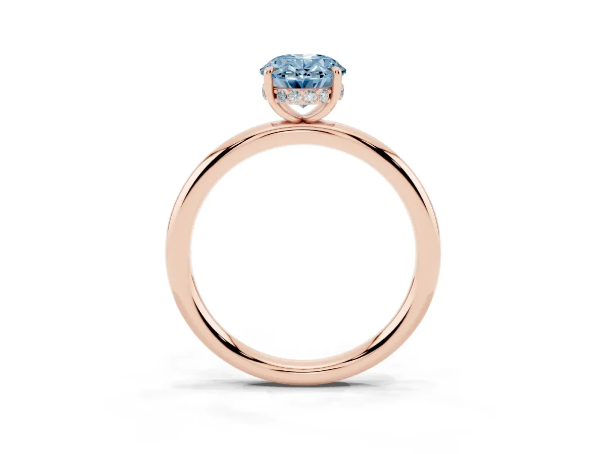 Fancy Blue Oval Cut Diamond Solitaire Ring with Thin Band and Four-Prong Setting Rose gold