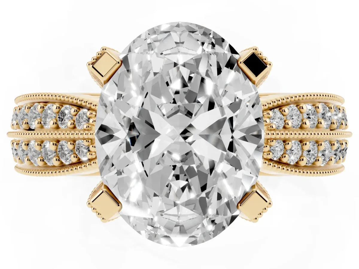 Oval Cut Diamond Solitaire Ring with Milgrain Round Pavé Band and Prong Setting Yellow gold