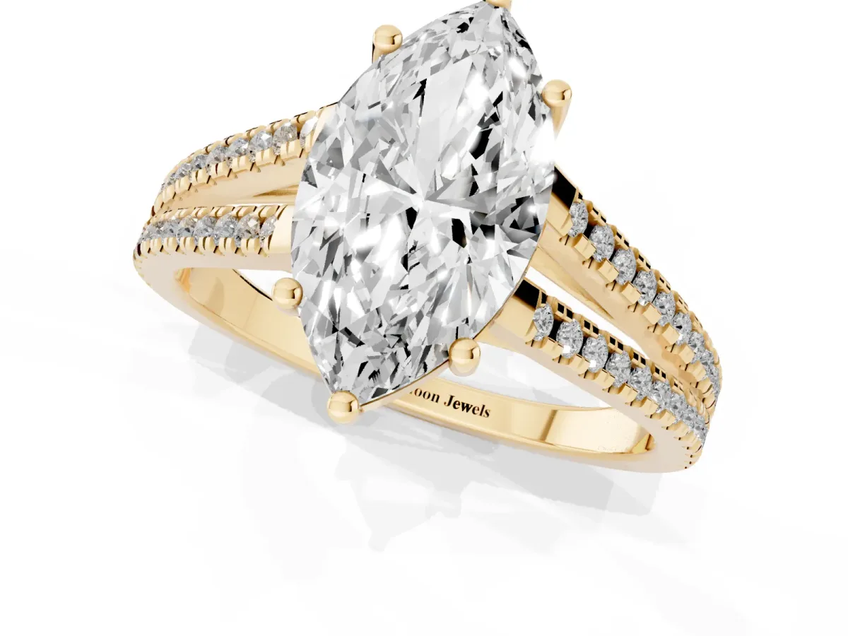 Marquise Cut Diamond Solitaire Engagement Ring with Split Shank Pavé Band Yellow gold